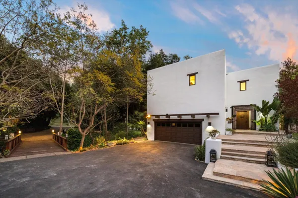 a view of house with outdoor space