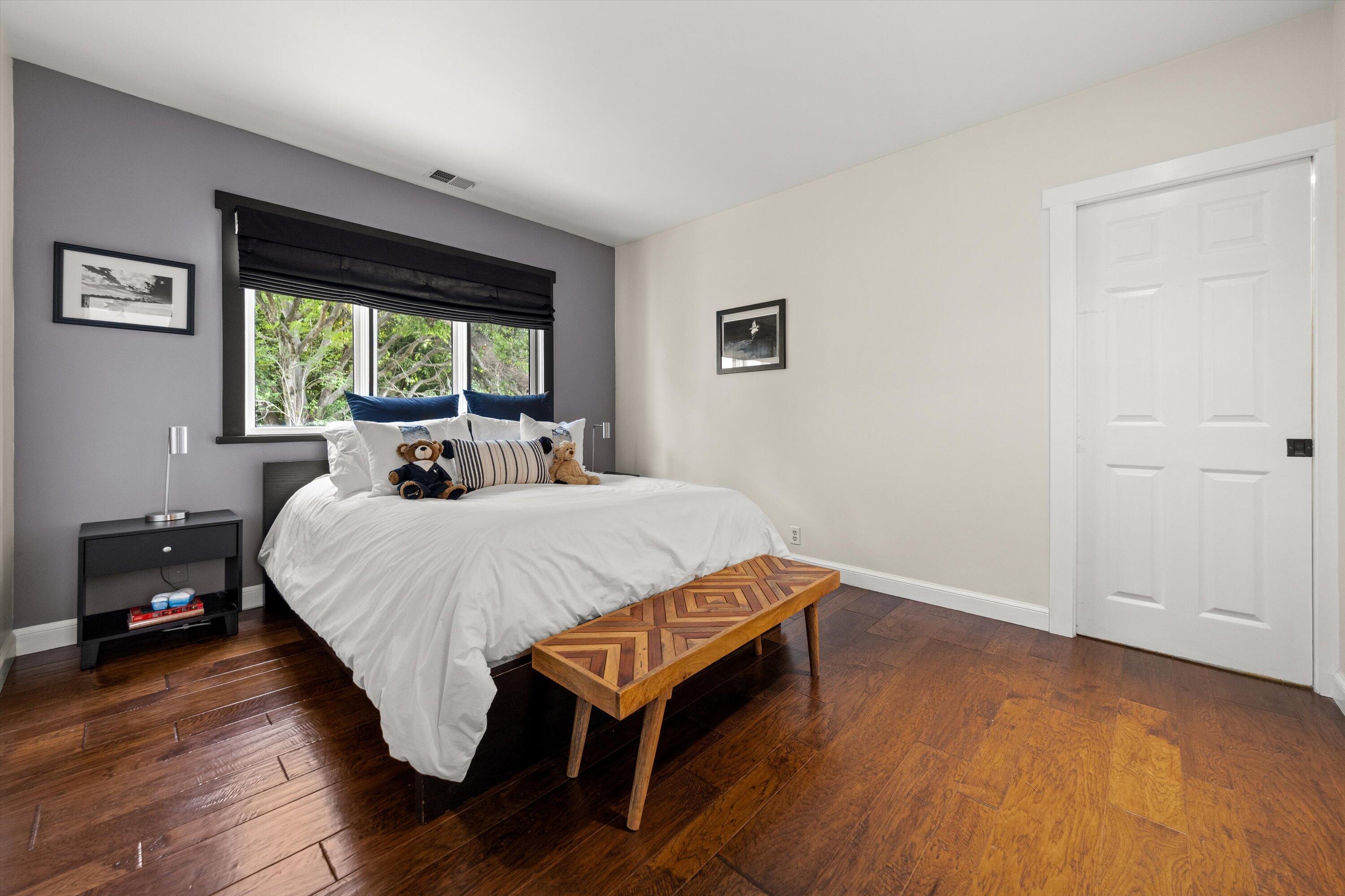 1435 Sycamore Canyon Road Santa Barbara, CA 93108 - Photo 22 of 49 a bed sitting in a bedroom next to a window