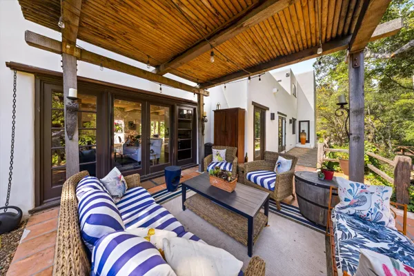 a outdoor living space with furniture and garden view