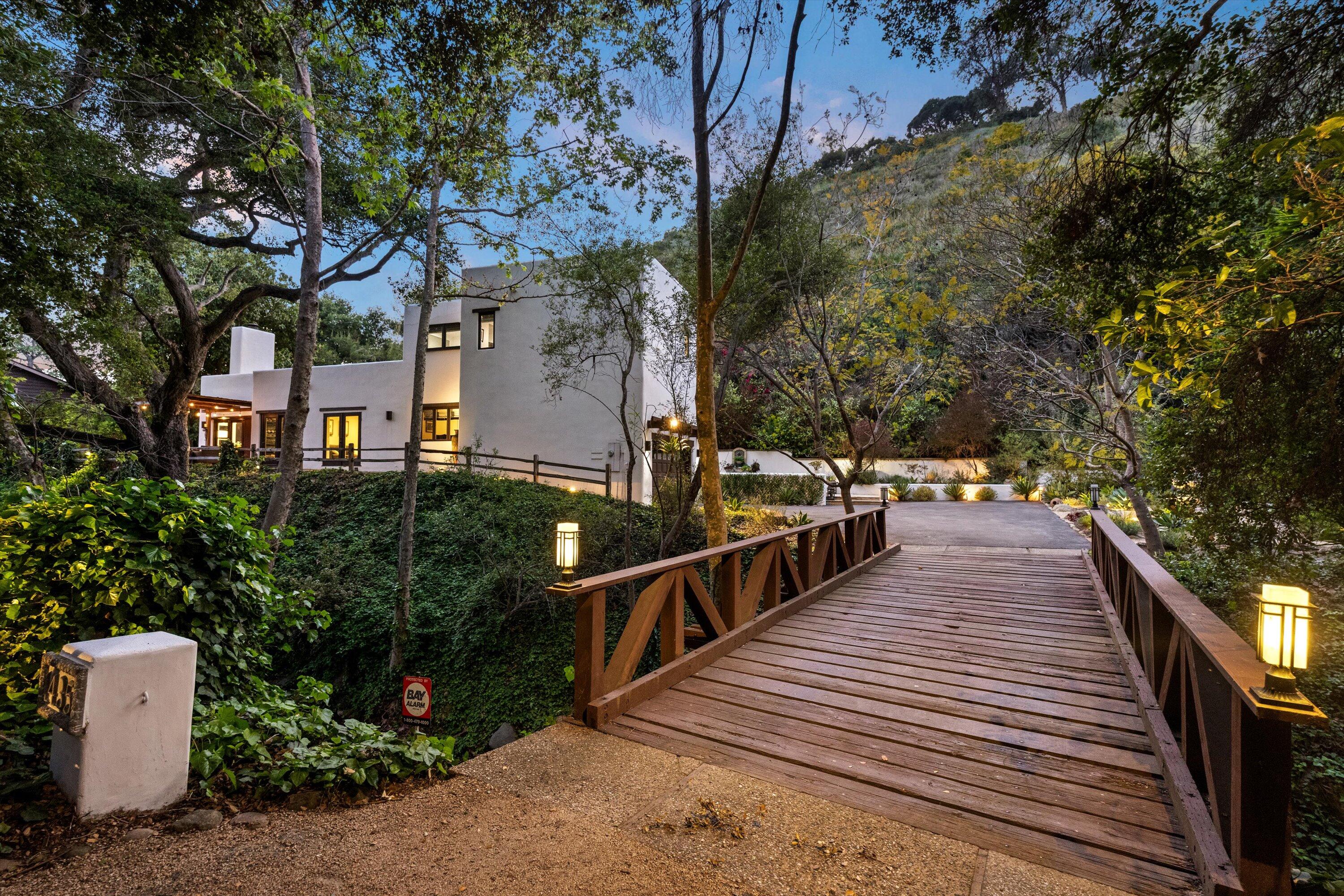 1435 Sycamore Canyon Road Santa Barbara, CA 93108 - Photo 37 of 49 a view of a house with backyard and trees