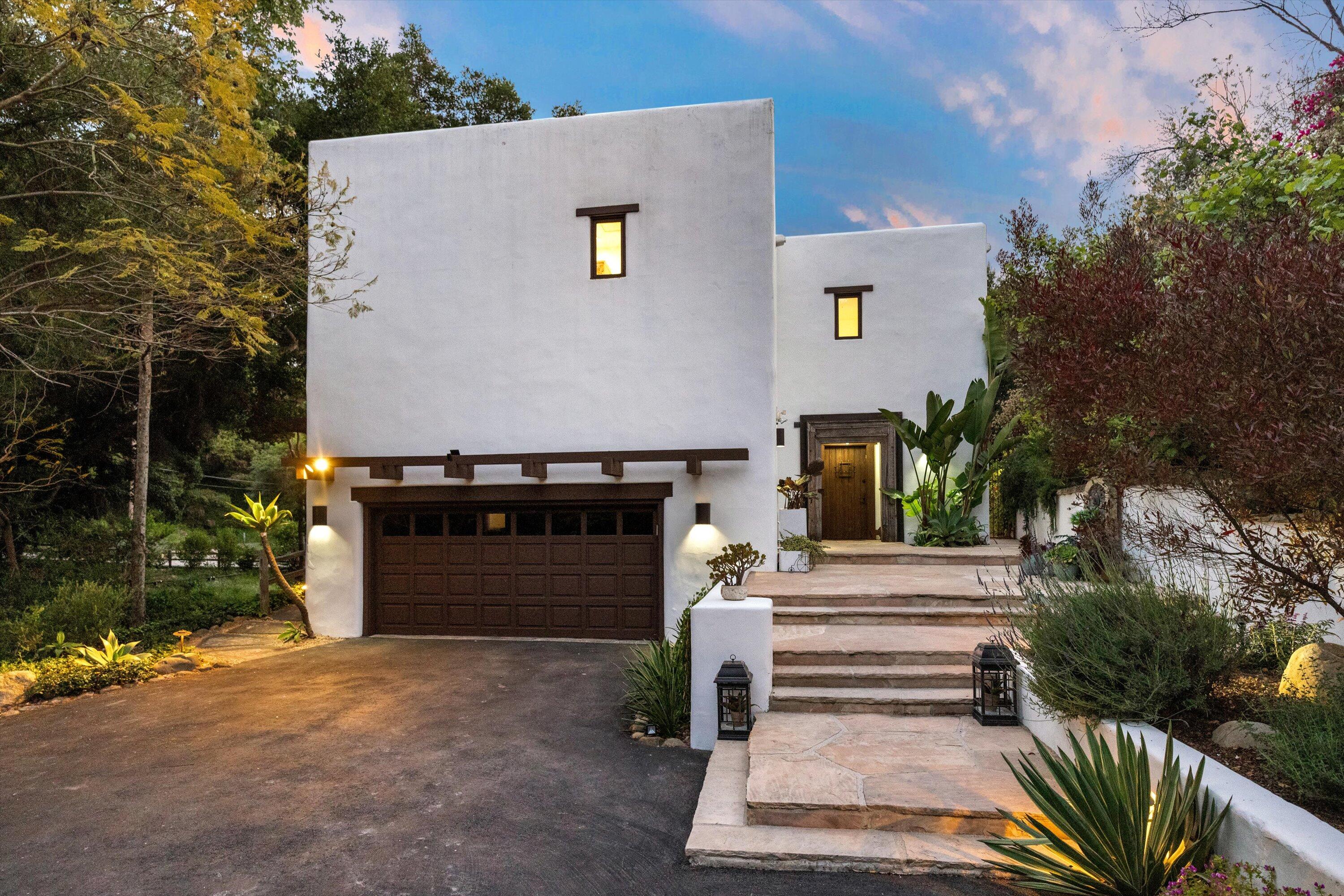 1435 Sycamore Canyon Road Santa Barbara, CA 93108 - Photo 38 of 49 a front view of a house with a yard