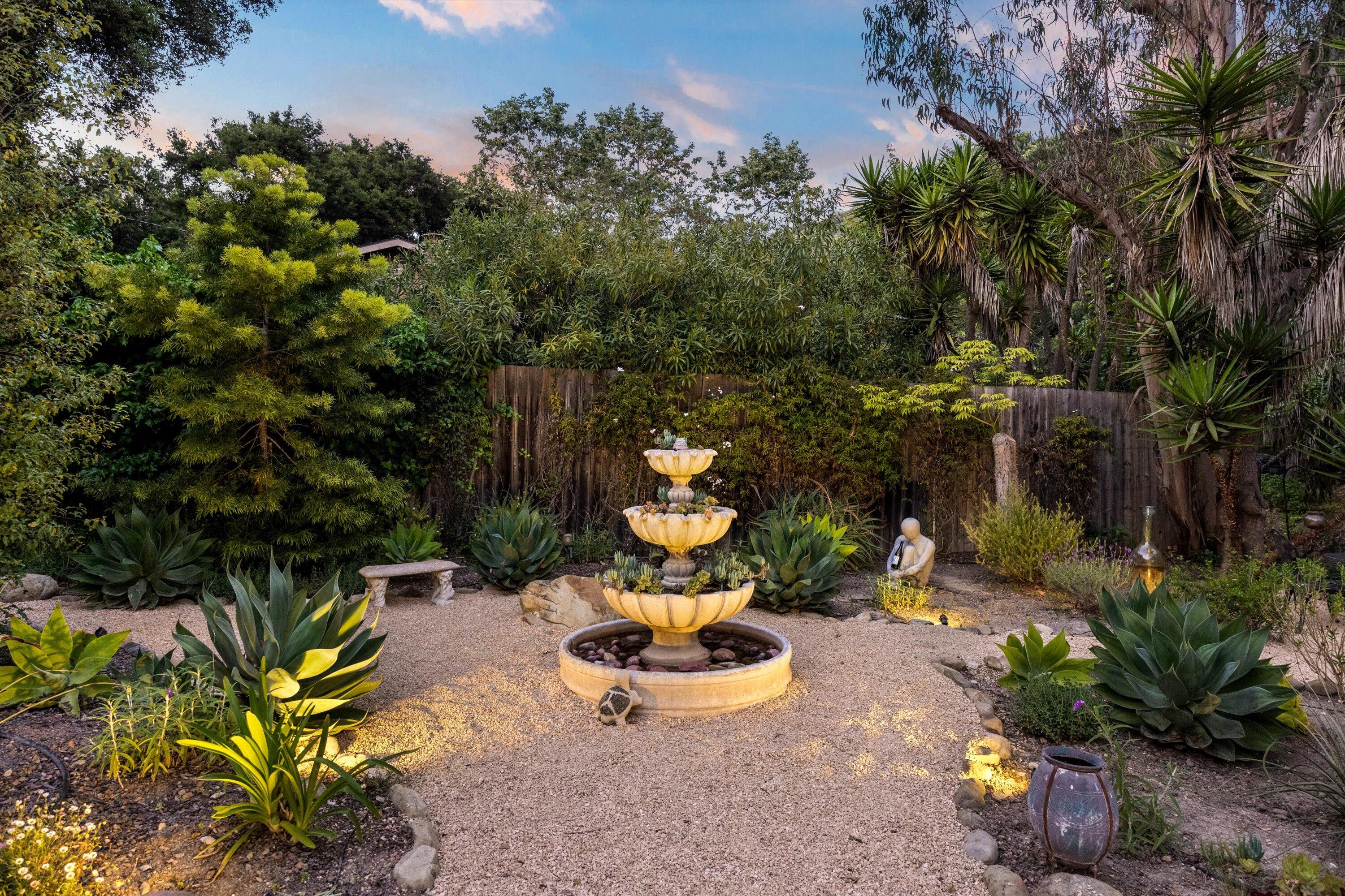 1435 Sycamore Canyon Road Santa Barbara, CA 93108 - Photo 39 of 49 a view of a backyard with sitting area and garden