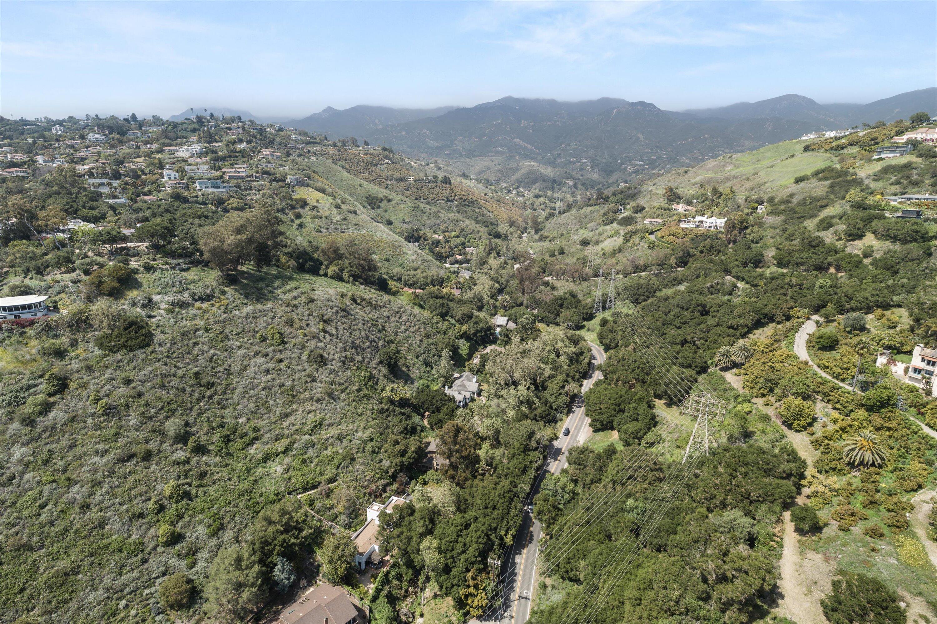 1435 Sycamore Canyon Road Santa Barbara, CA 93108 - Photo 47 of 49 a view of a mountain in the distance in a field