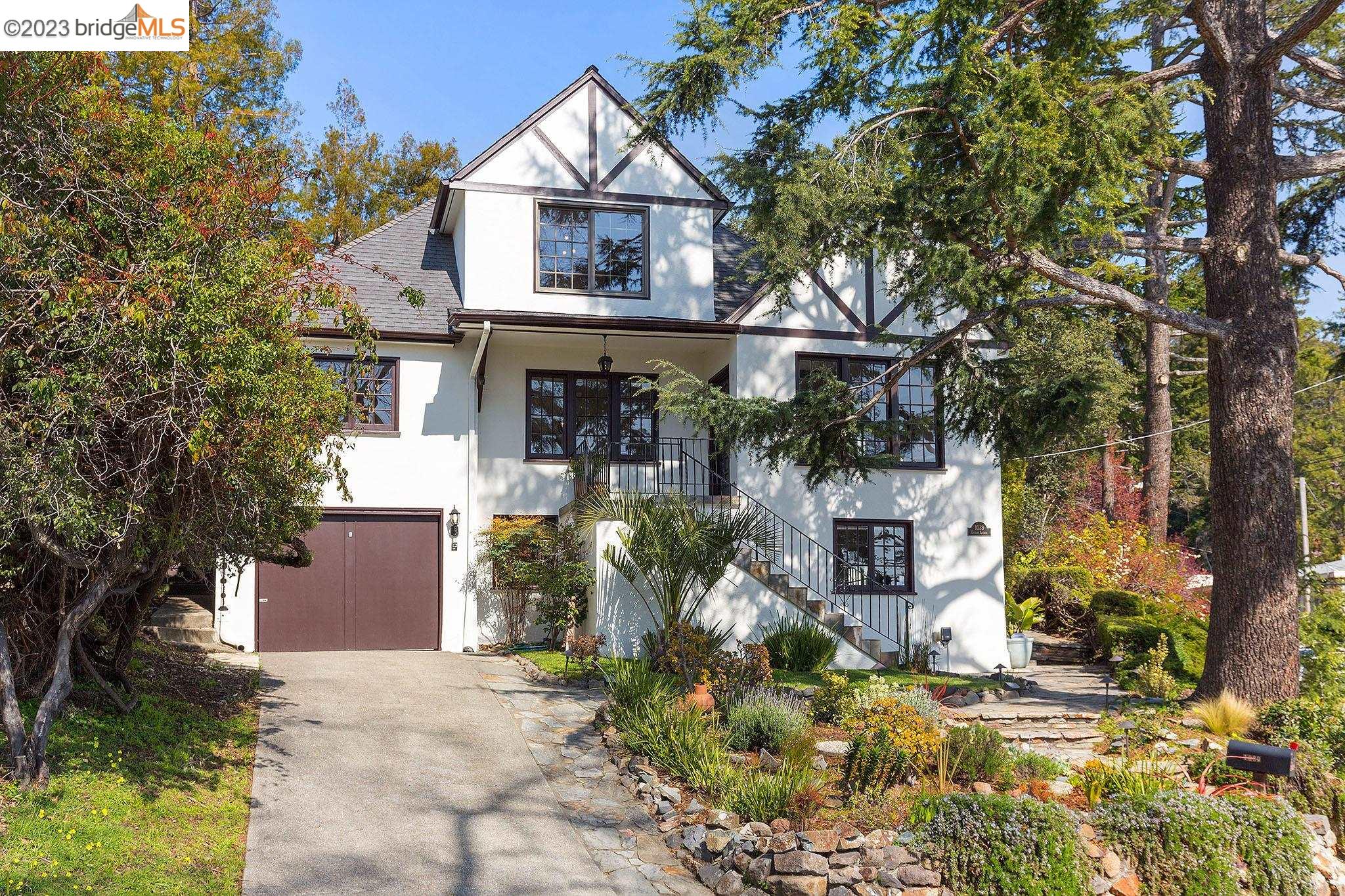 1039 Euclid Avenue Berkeley, CA 94708 - Photo 1 of 1 a front view of a house with a yard