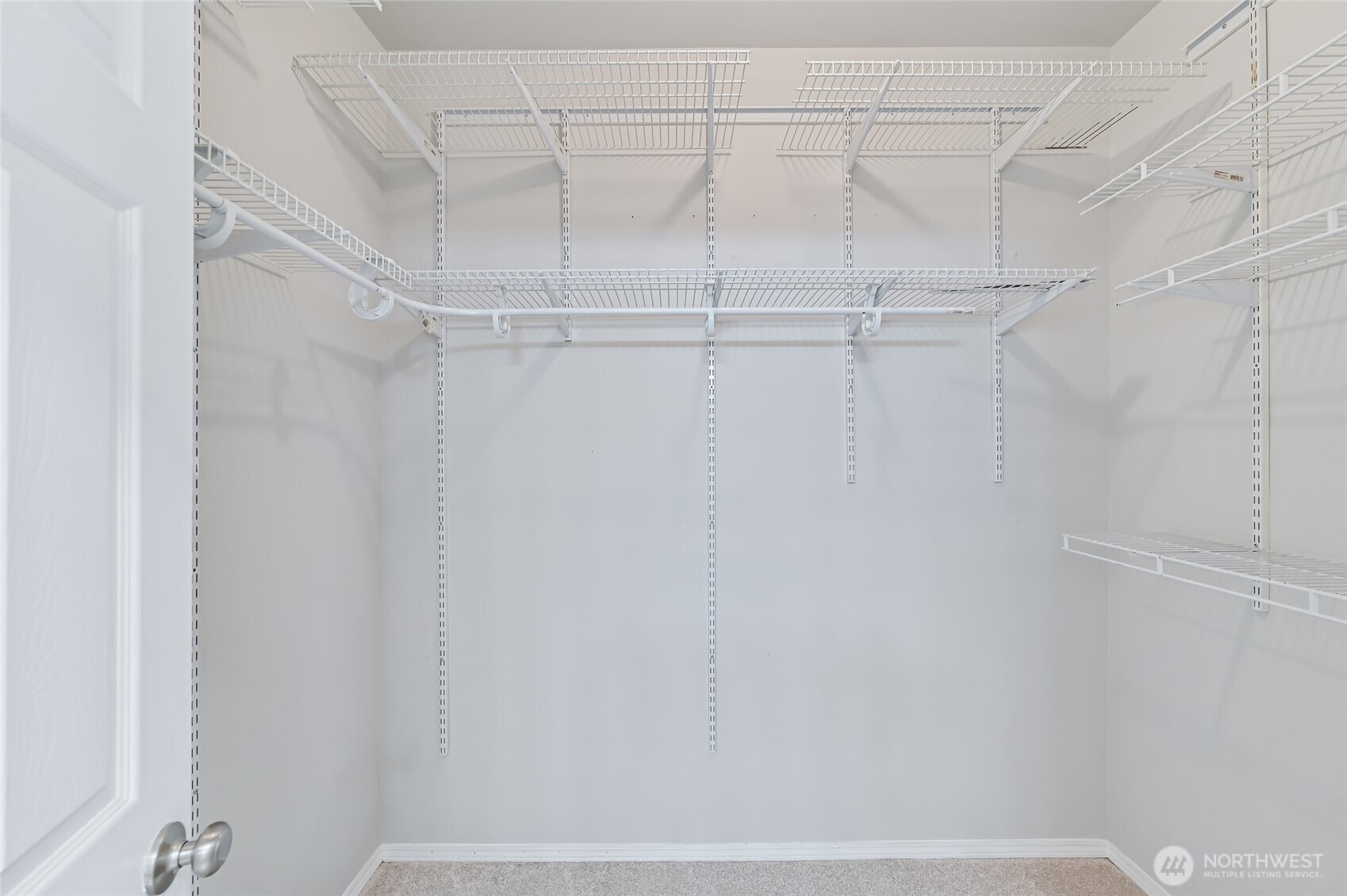 12109 Northeast 171st Place, Unit B103 Bothell, WA 98011 - Photo 15 of 39 a view of a rack on the wall