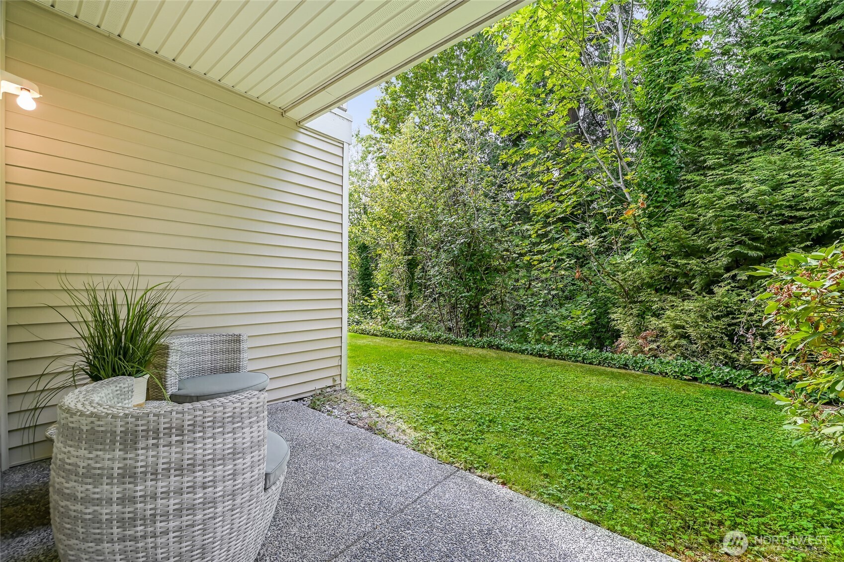 12109 Northeast 171st Place, Unit B103 Bothell, WA 98011 - Photo 23 of 39 a house view with a garden space