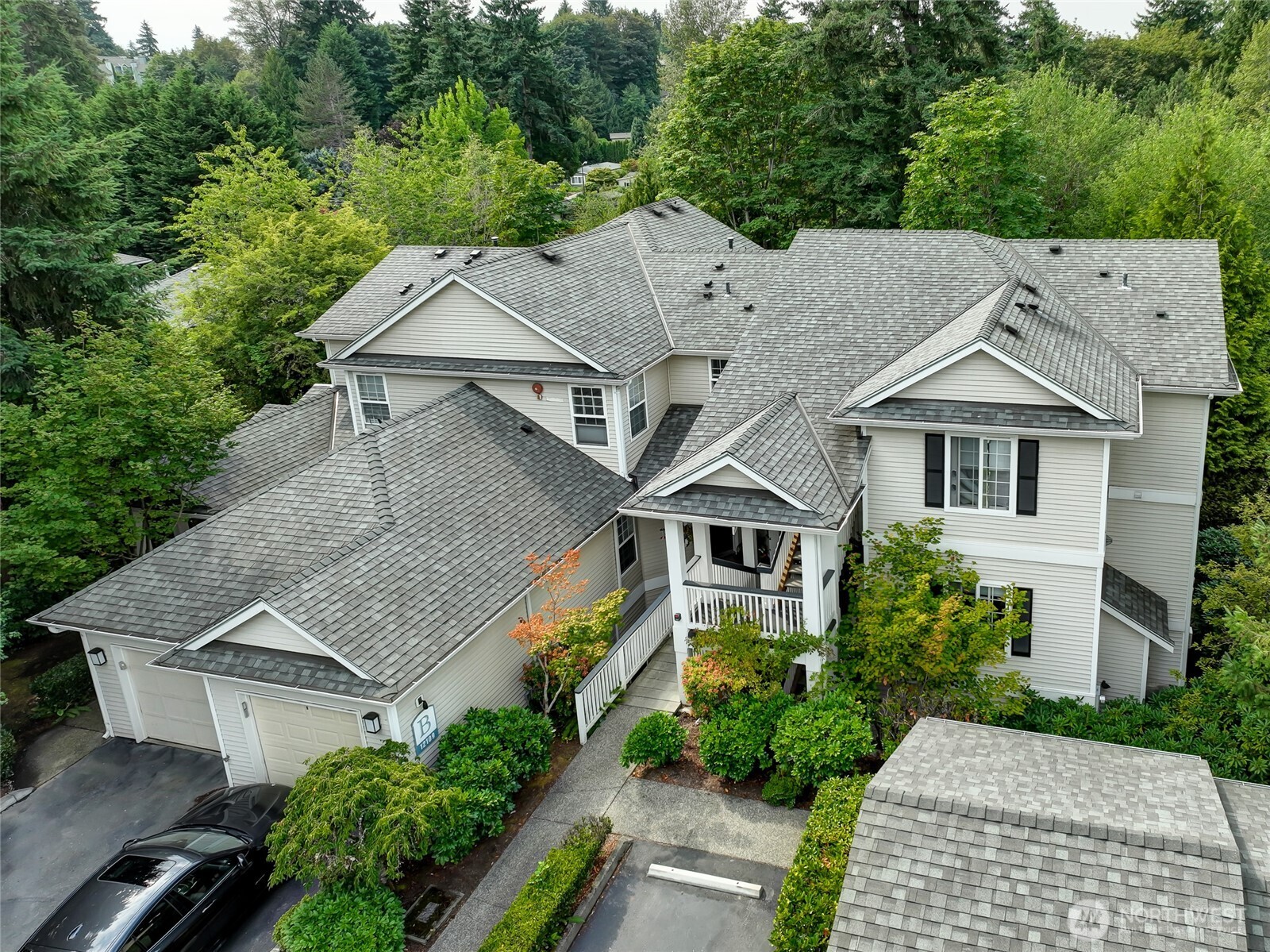 12109 Northeast 171st Place, Unit B103 Bothell, WA 98011 - Photo 27 of 39 an aerial view of a house with a yard