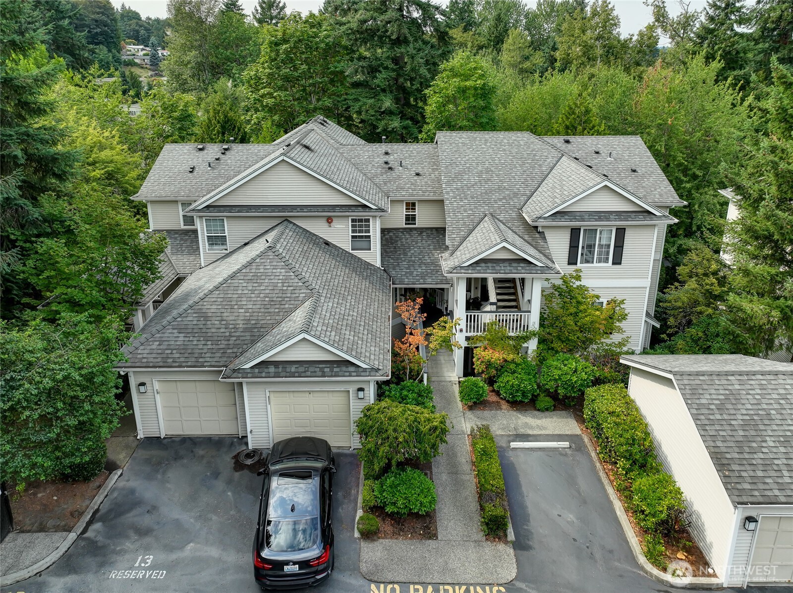 12109 Northeast 171st Place, Unit B103 Bothell, WA 98011 - Photo 28 of 39 an aerial view of a house with a yard