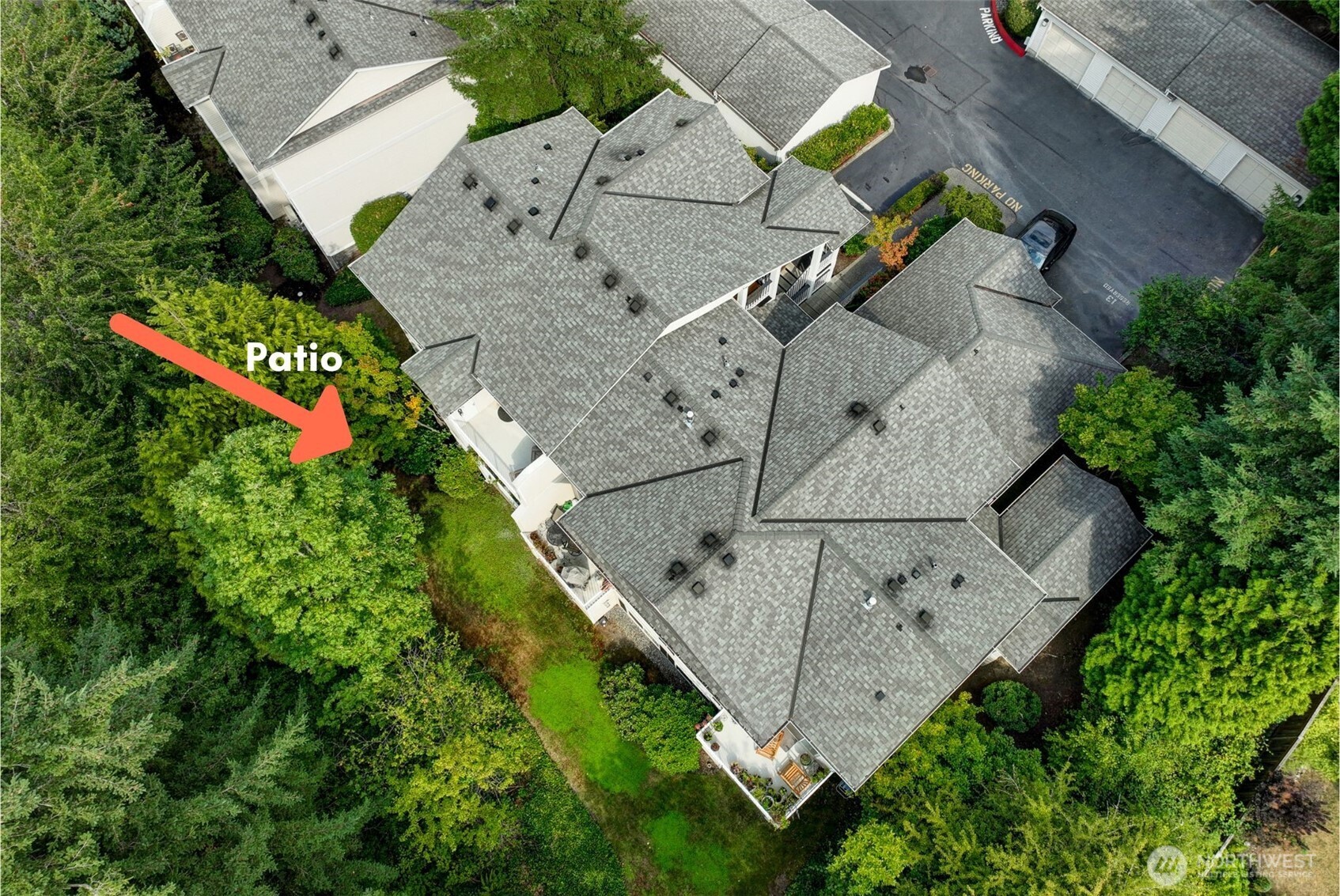 12109 Northeast 171st Place, Unit B103 Bothell, WA 98011 - Photo 32 of 39 an aerial view of a house with a yard and garden