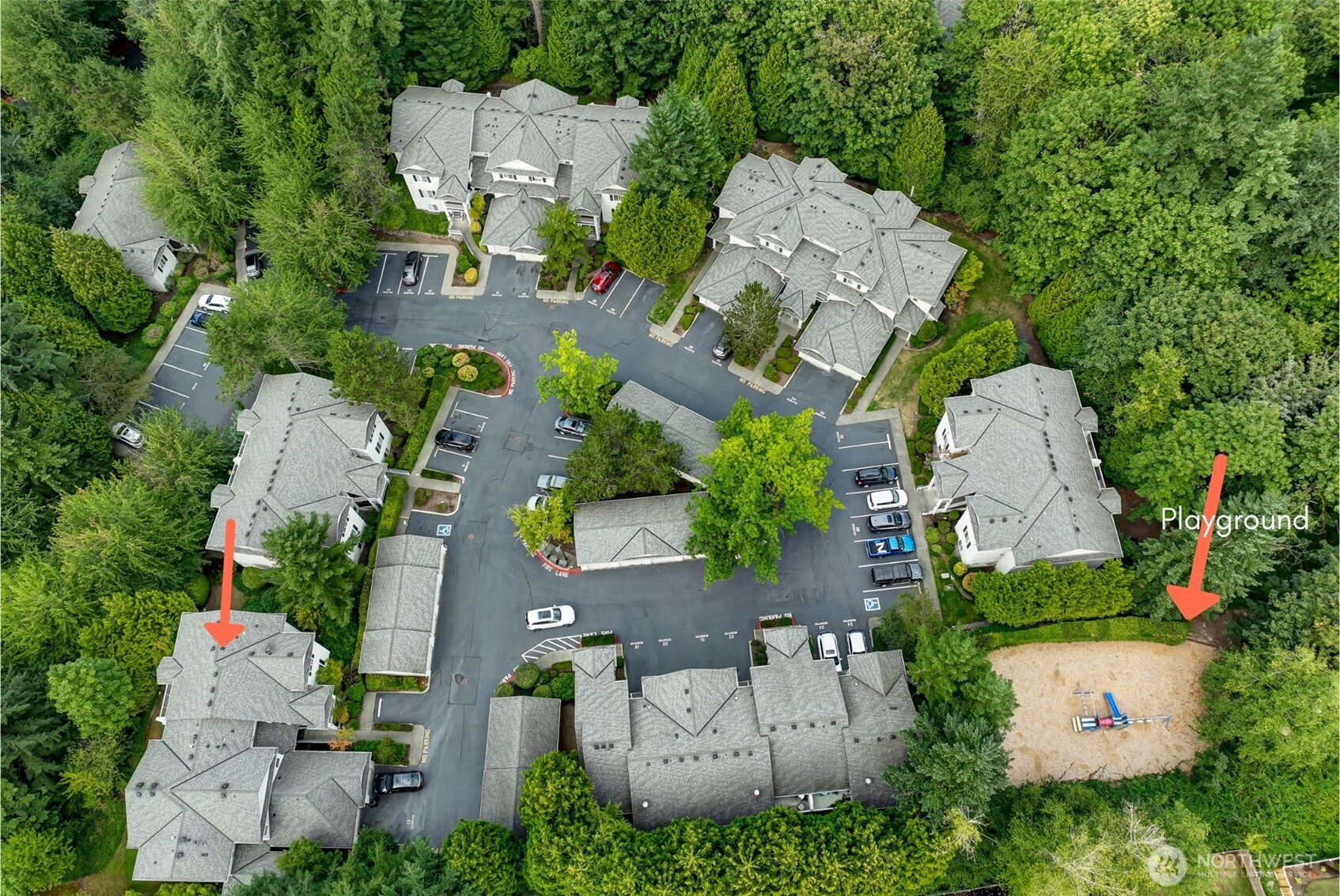 12109 Northeast 171st Place, Unit B103 Bothell, WA 98011 - Photo 34 of 39 an aerial view of a house with outdoor space and a parking