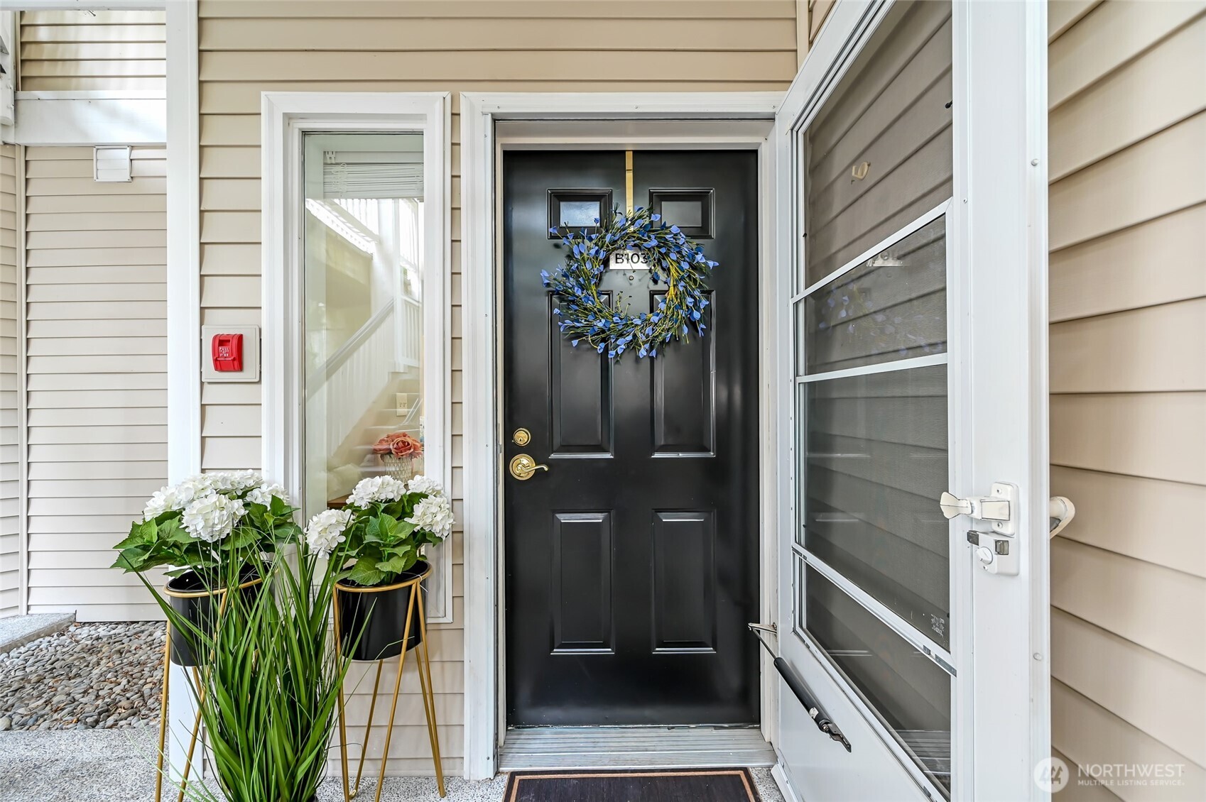 12109 Northeast 171st Place, Unit B103 Bothell, WA 98011 - Photo 4 of 39 a view of a entryway of the house front of main door
