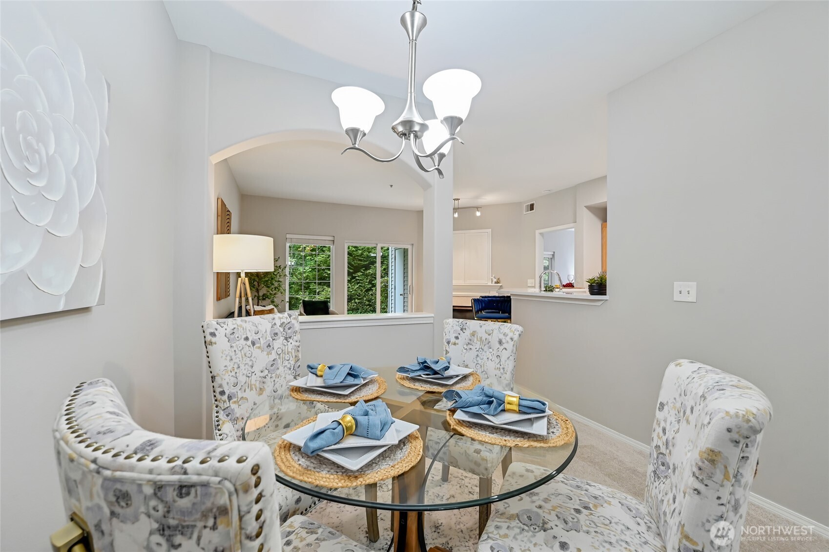 12109 Northeast 171st Place, Unit B103 Bothell, WA 98011 - Photo 7 of 39 a view of a dining room with furniture window and outside view