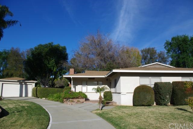 2803 Iron Hills Way Riverside, CA 92506 - Photo 1 of 1 a front view of a house with a yard