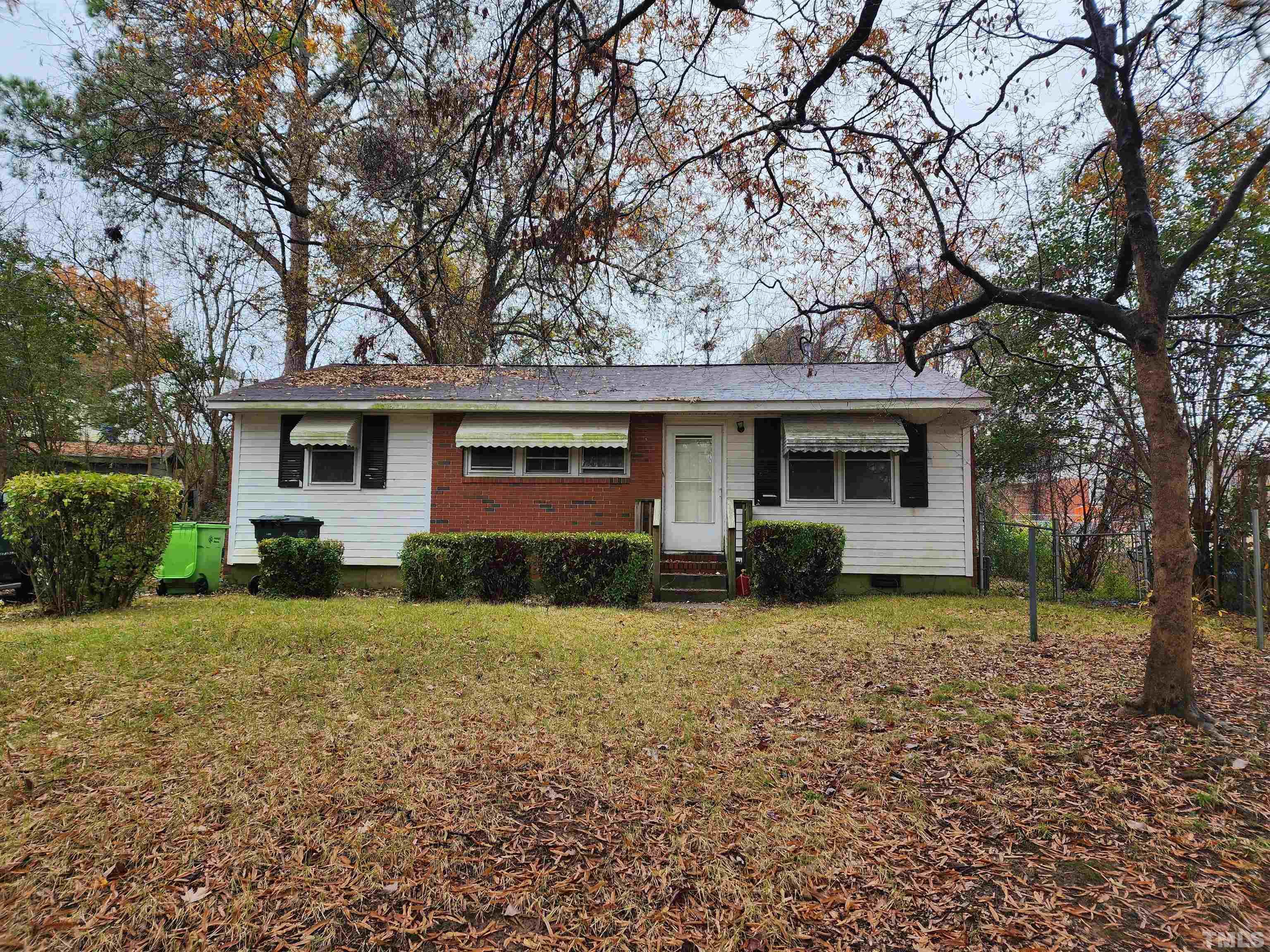 808 Newcombe Road Raleigh, NC 27610 - Photo 1 of 4 front view of a house with a yard