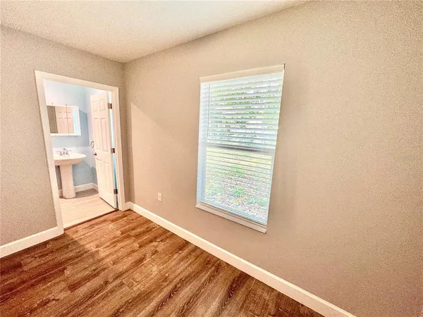a backyard of a house with lots of green space