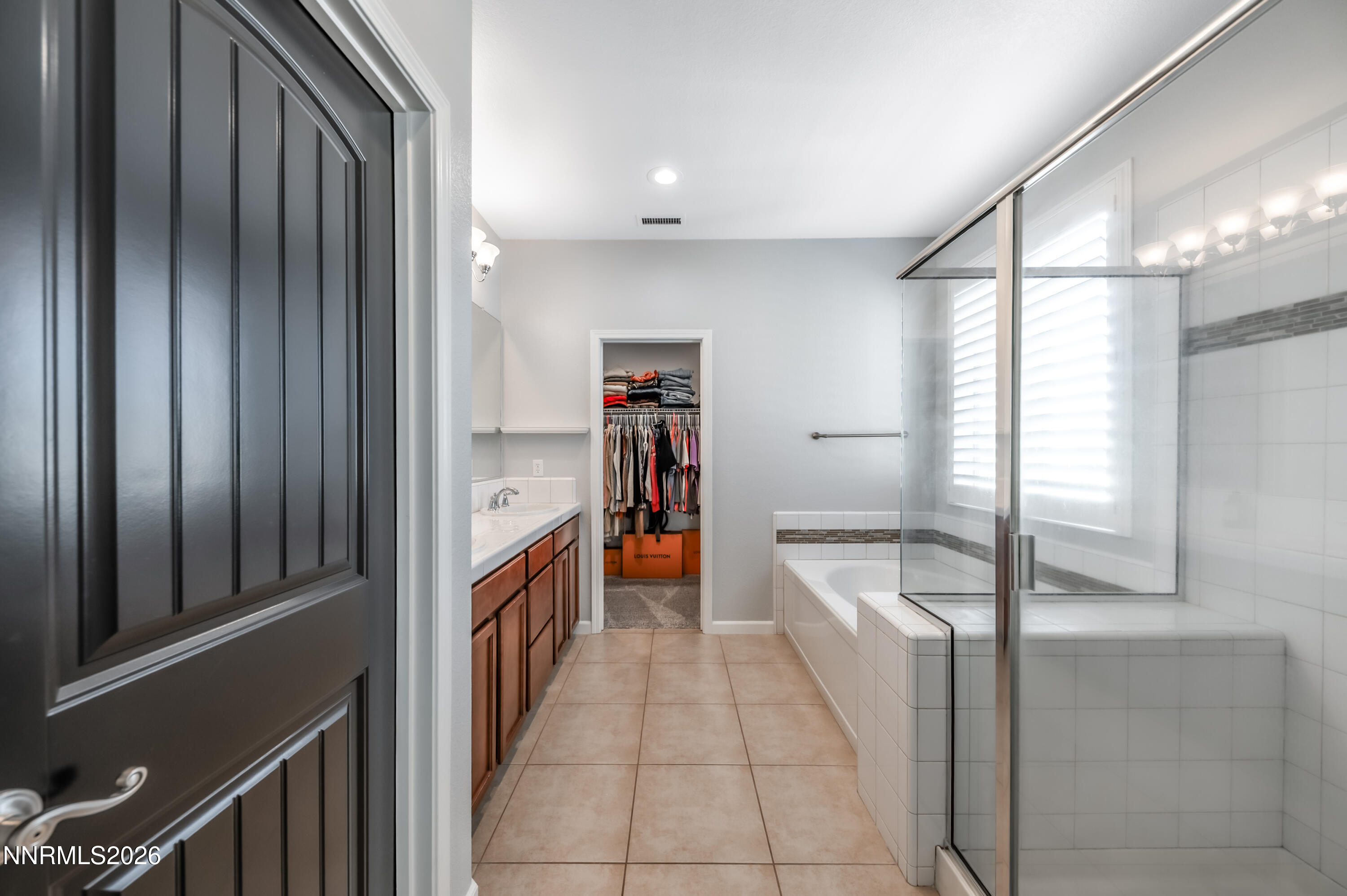 9530 Vikingholm Road Reno, NV 89521 - Photo 22 of 42 a hallway with washer and dryer