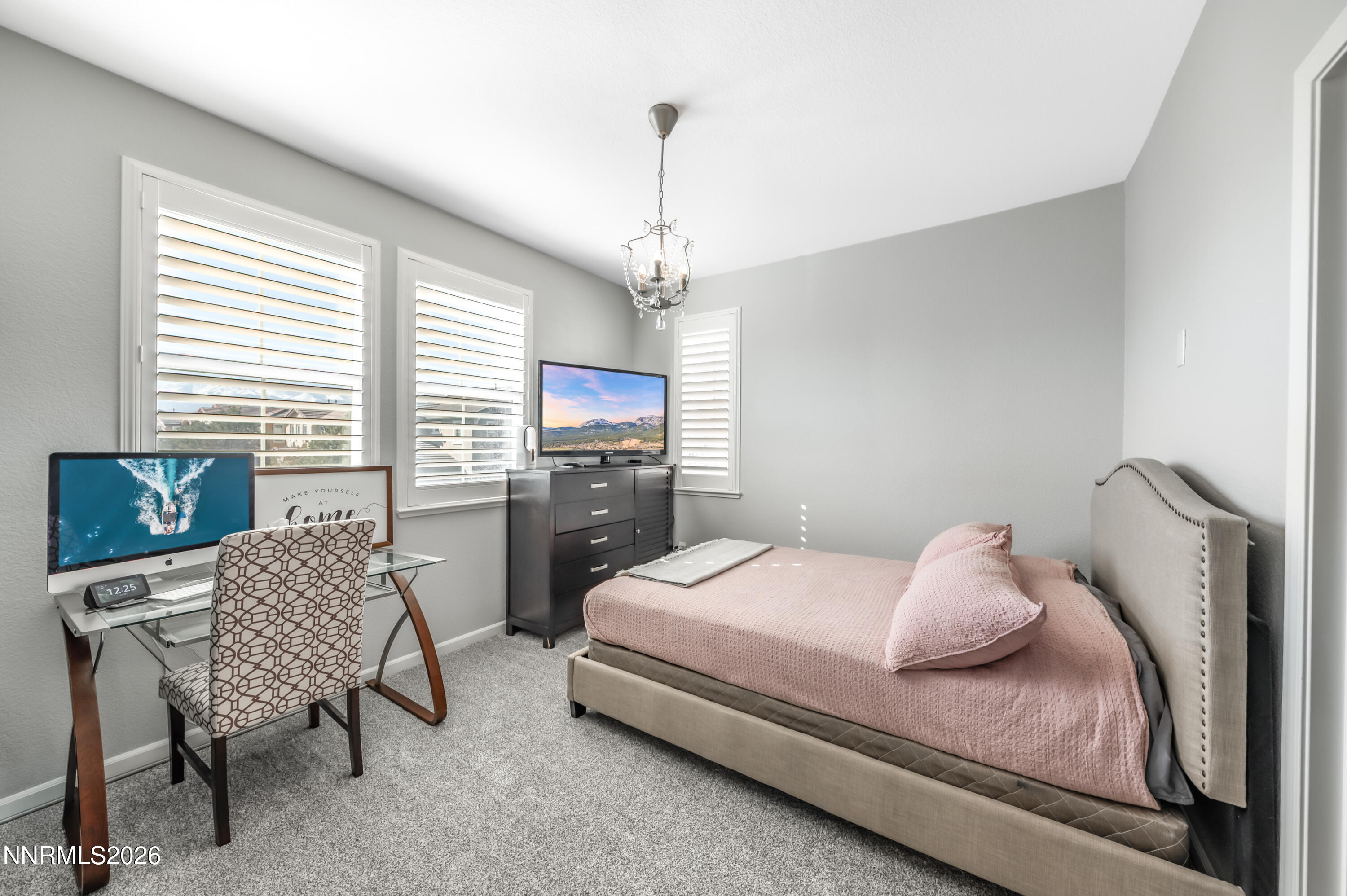 9530 Vikingholm Road Reno, NV 89521 - Photo 30 of 42 a bedroom with bed and window