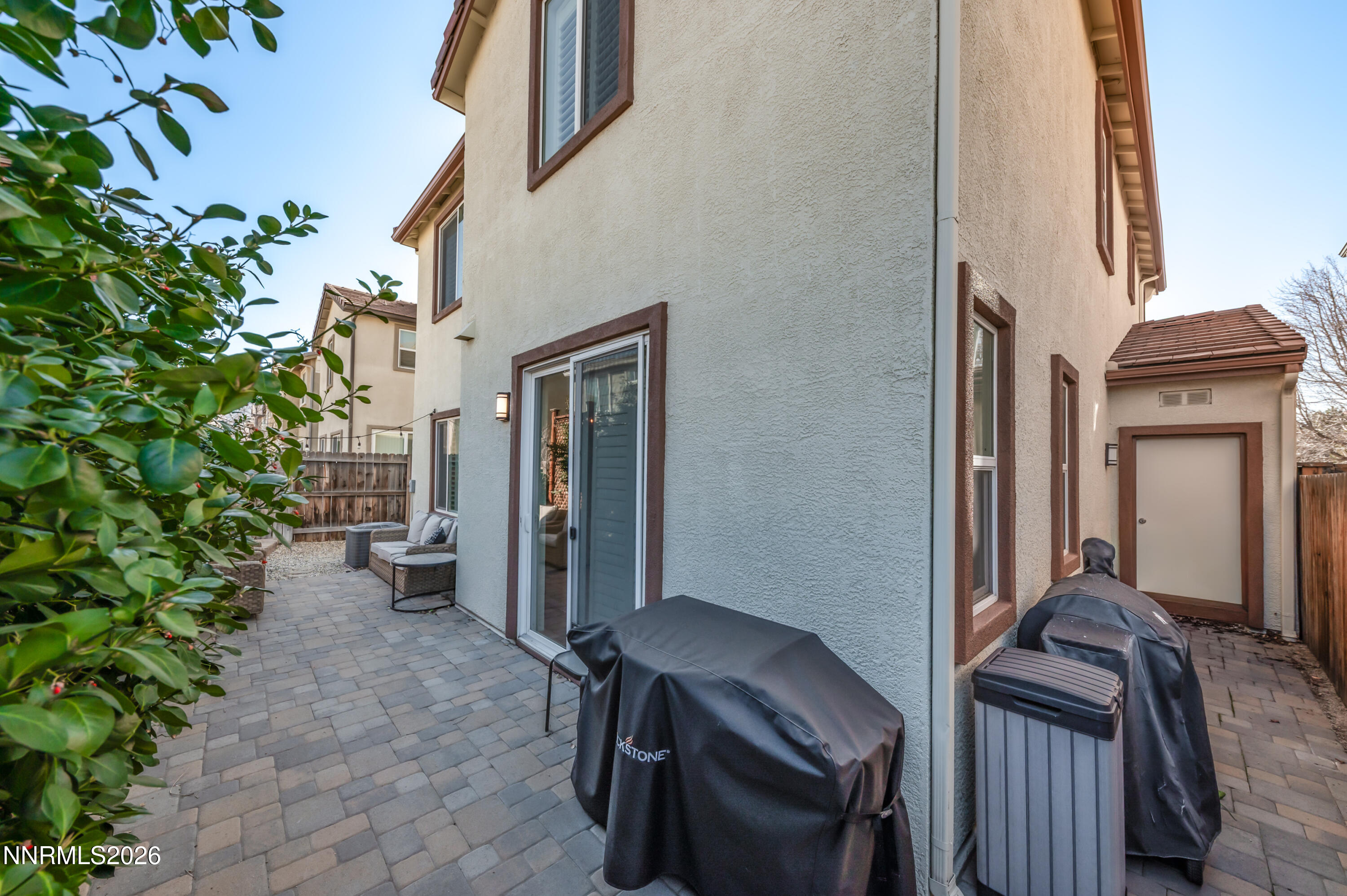 9530 Vikingholm Road Reno, NV 89521 - Photo 33 of 42 a view of balcony with furniture and a potted plant