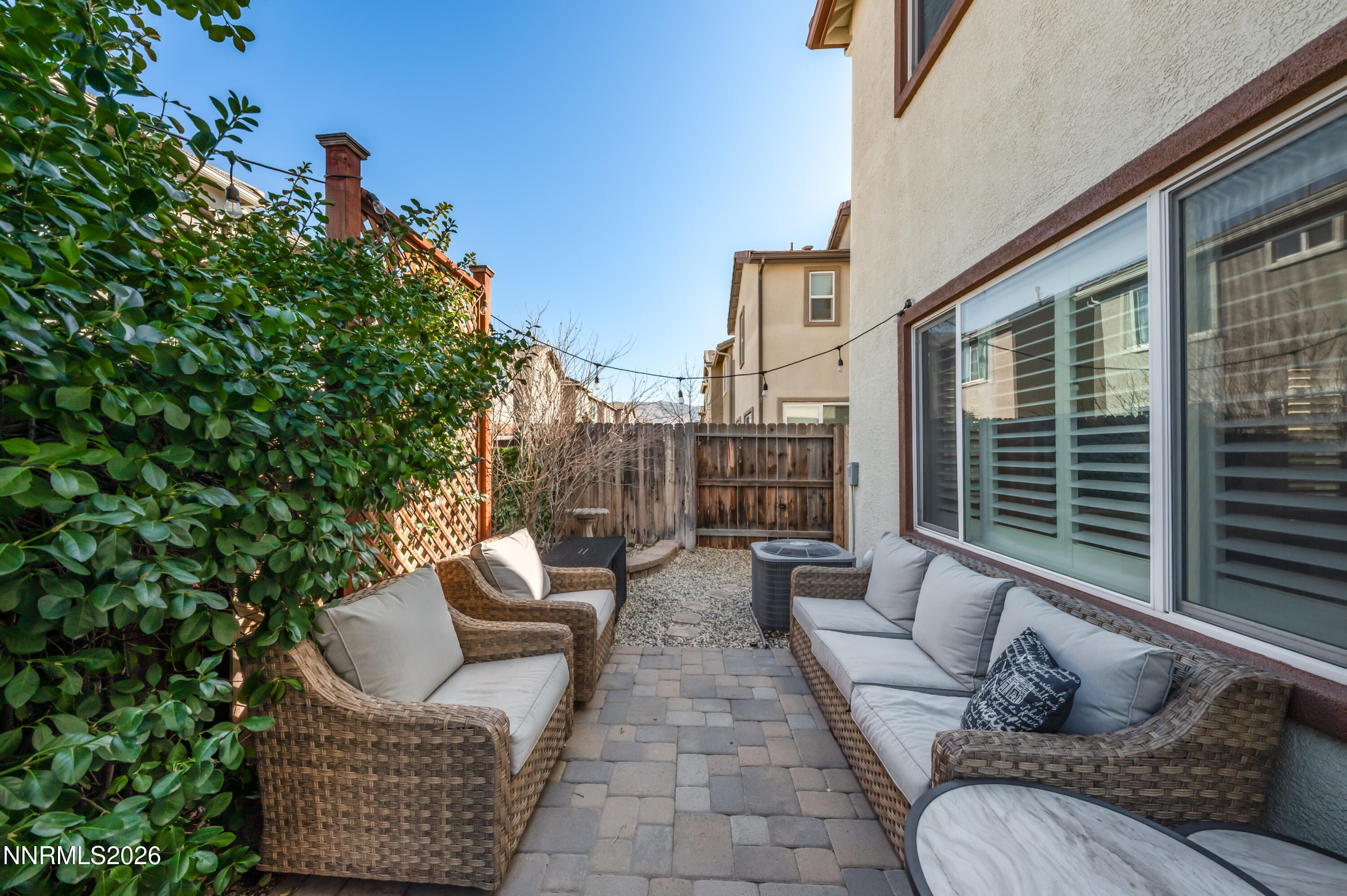 9530 Vikingholm Road Reno, NV 89521 - Photo 35 of 42 a view of a patio with couches chairs and potted plants