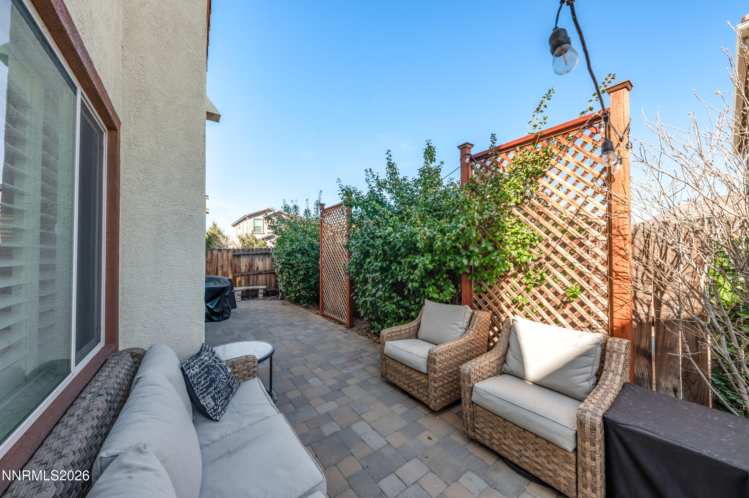 9530 Vikingholm Road Reno, NV 89521 - Photo 36 of 42 a outdoor living space with furniture and a potted plant