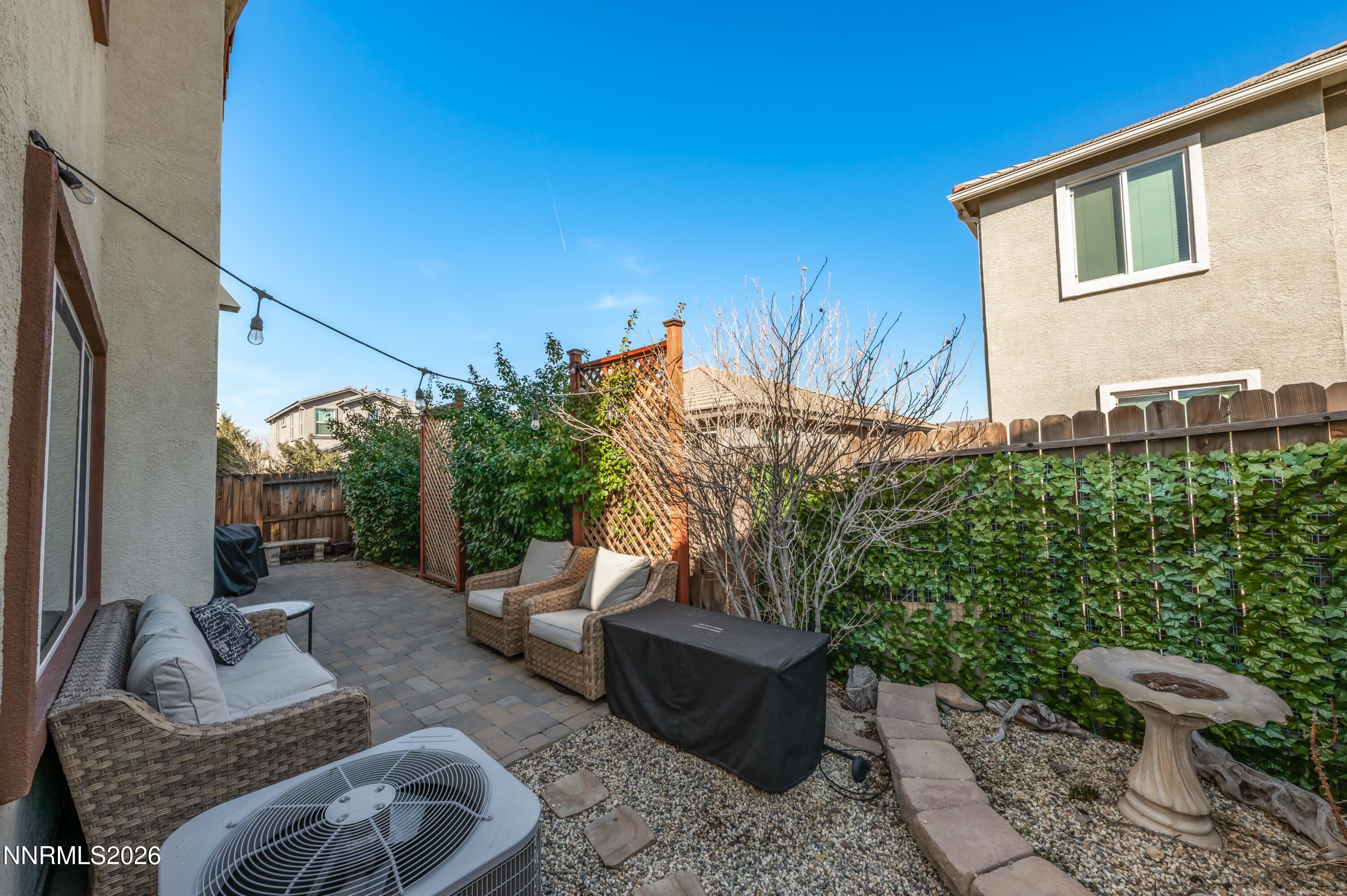 9530 Vikingholm Road Reno, NV 89521 - Photo 38 of 42 a view of a patio with couches and potted plants