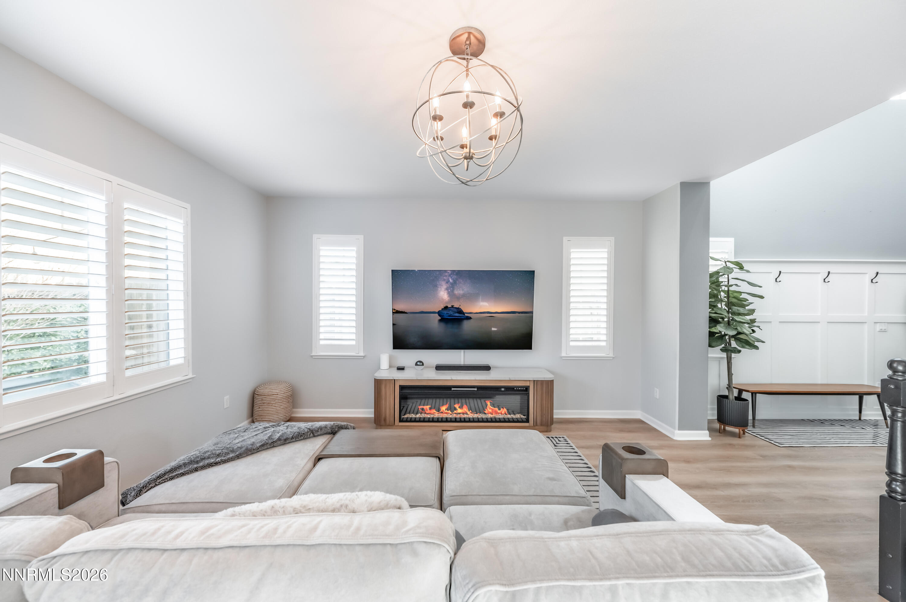 9530 Vikingholm Road Reno, NV 89521 - Photo 5 of 42 a living room with furniture and a flat screen tv