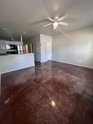a view of a house with a ceiling fan