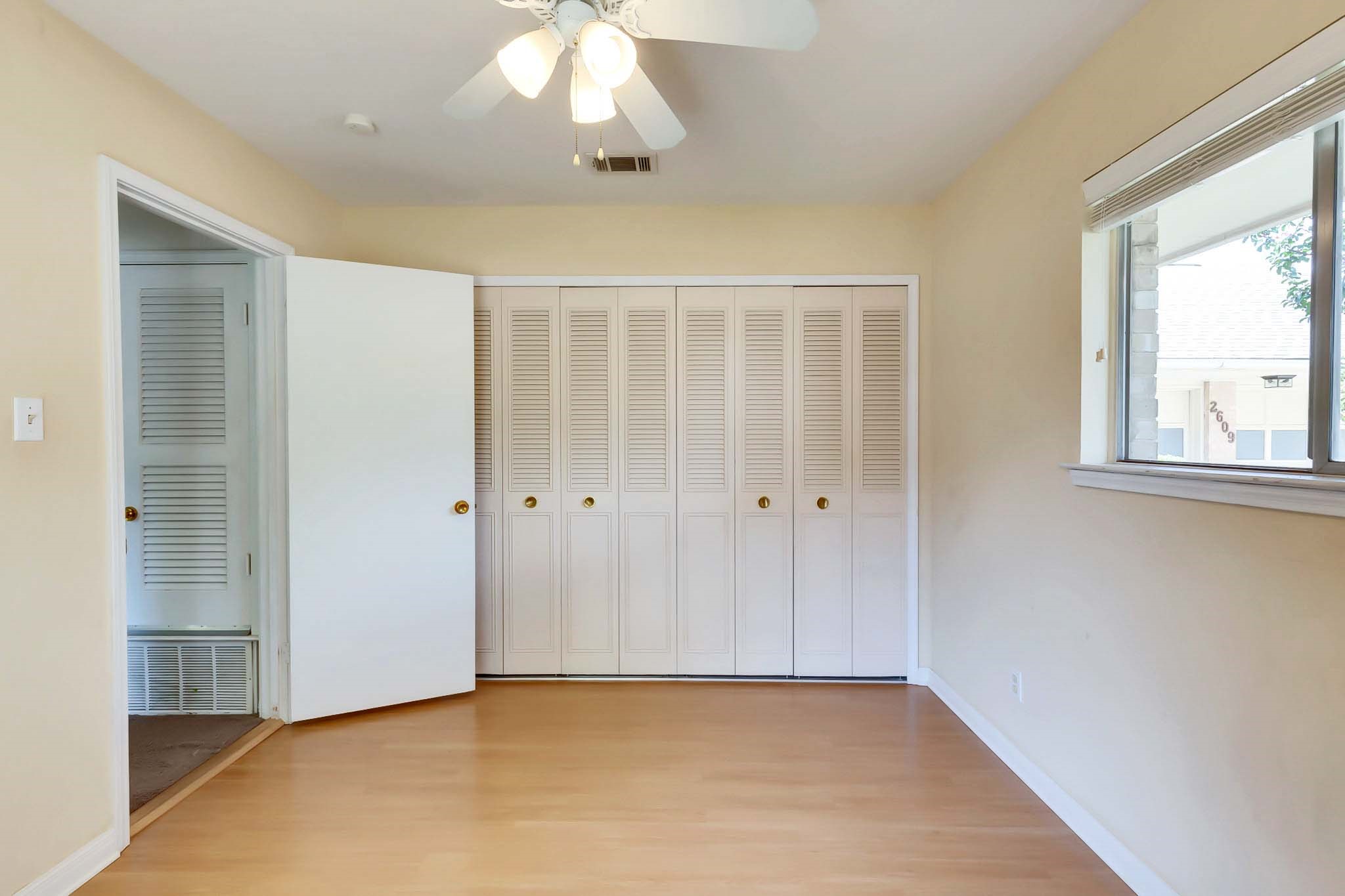 2609 Richcreek Road Austin, TX 78757 - Photo 22 of 28 a view of an empty room with a window