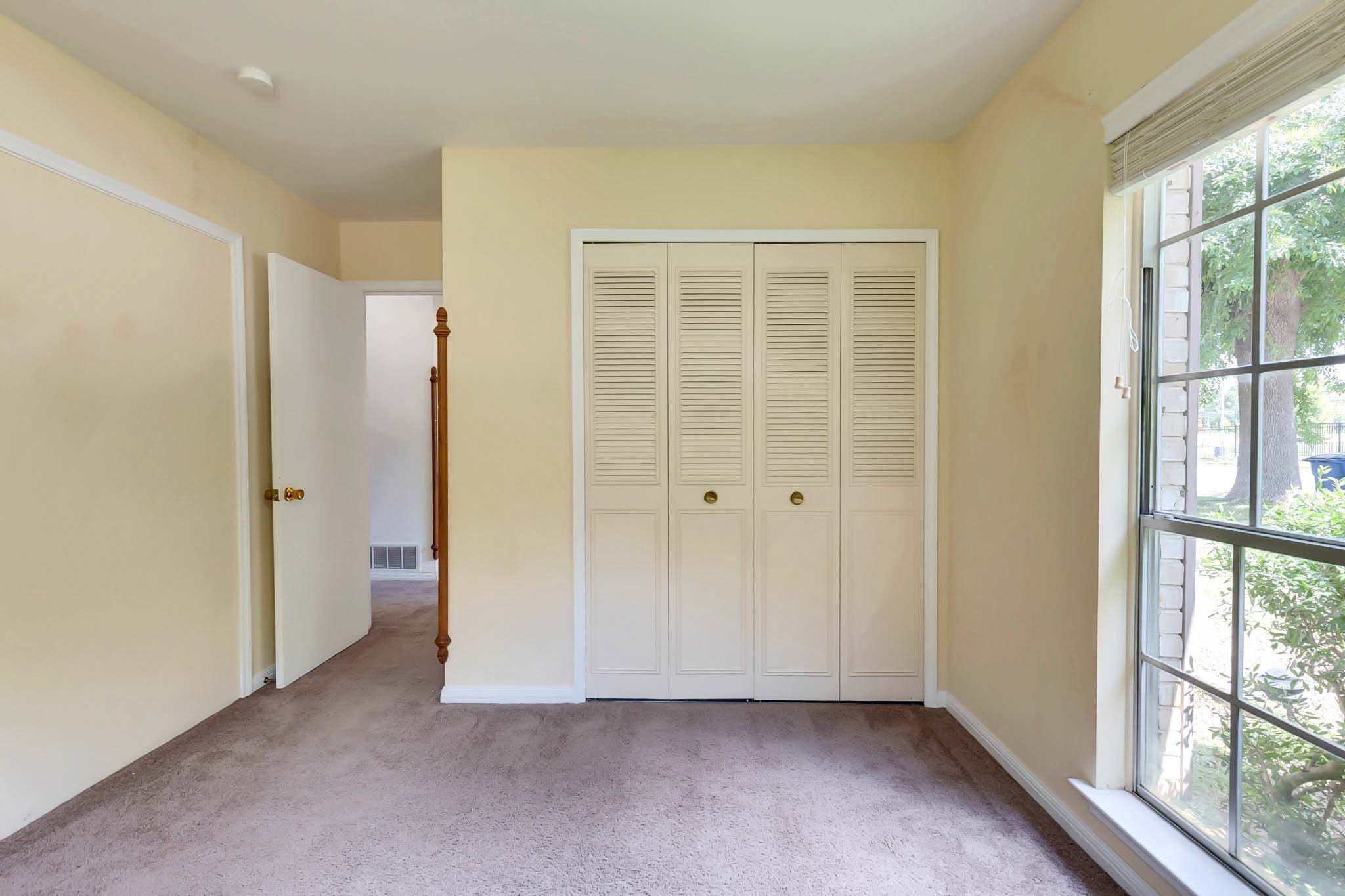 2609 Richcreek Road Austin, TX 78757 - Photo 24 of 28 a view of an empty room with a window