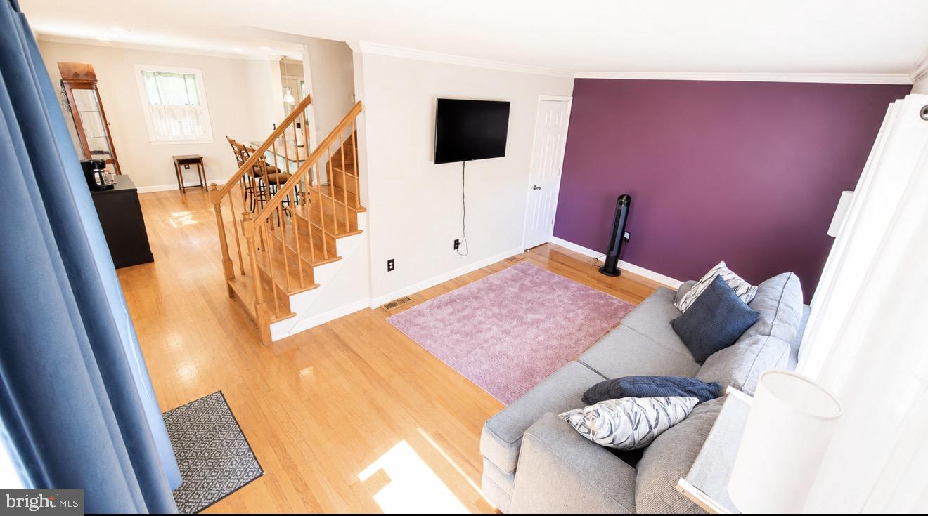 8027 Park Haven Road Dundalk, MD 21222 - Photo 4 of 13 Bright and inviting living space.
Edit with AI