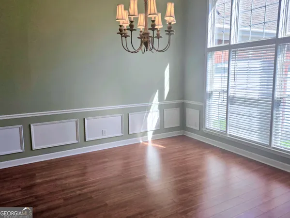 a view of livingroom with hardwood floor and window