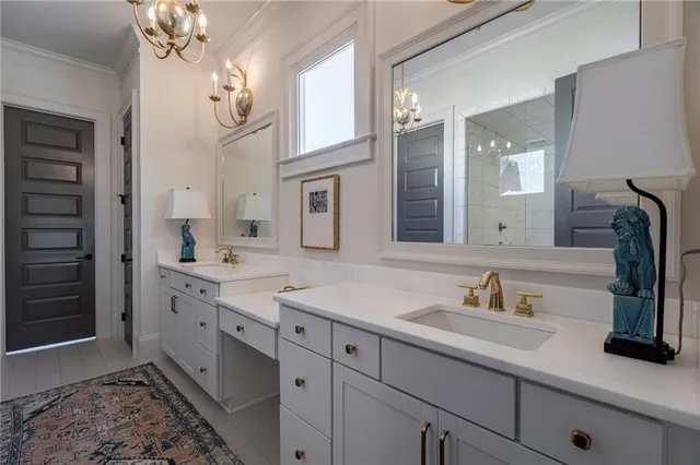 a bathroom with a sink double vanity and a mirror