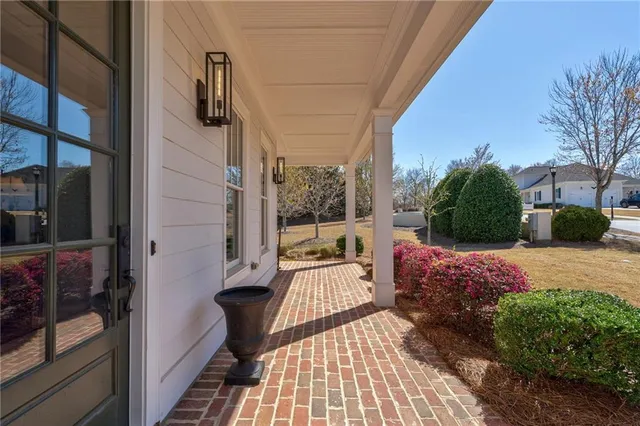 a view of a porch with furniture