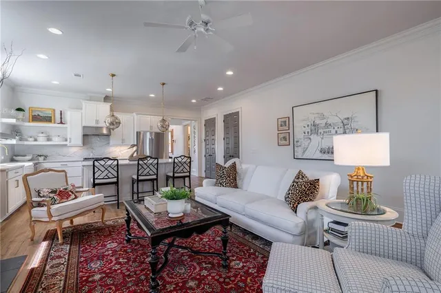 a living room with furniture and a table