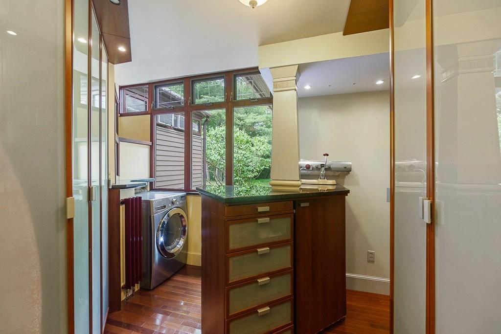 10 Charme Road Billerica, MA 01821 - Photo 14 of 42 a bathroom with a sink a mirror and a window