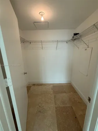 a view of a room with racks on the wall