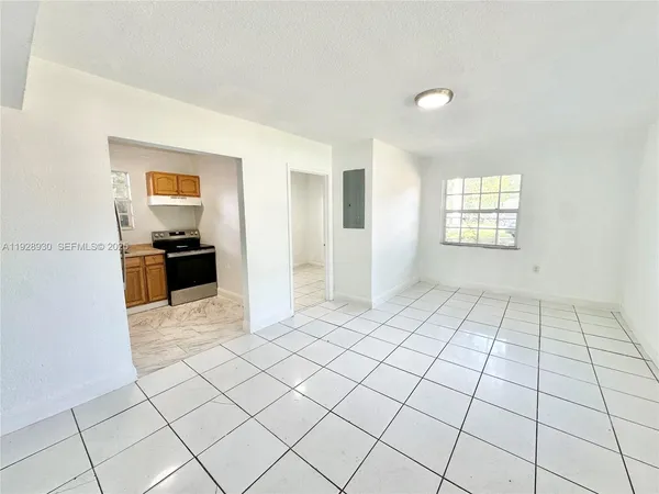 a view of an empty room and window