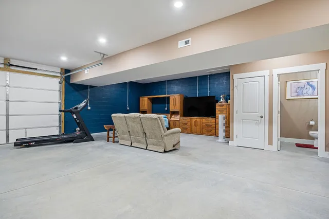 a living room with furniture and a table