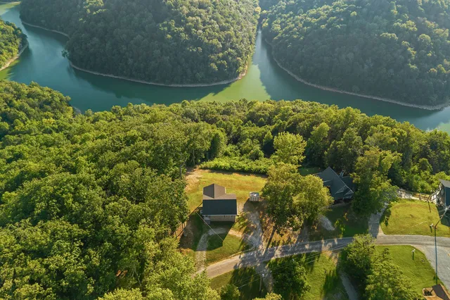 a view of a lake with a yard