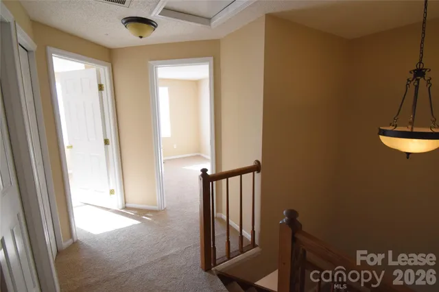 a view of a hallway with elevator