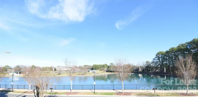 a view of a lake and middle of a city