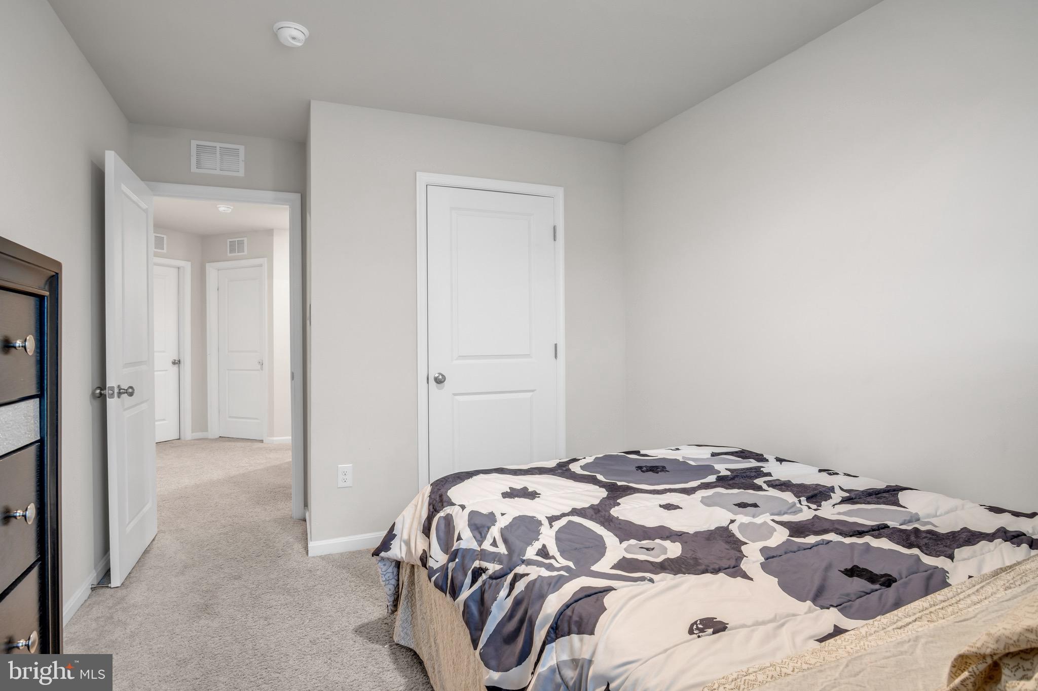 18 Smokehouse Road Carlisle, PA 17013 - Photo 27 of 33 a bedroom with a bed and a cabinets