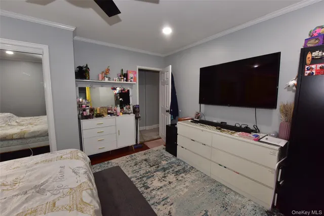 a room with furniture and flat screen tv