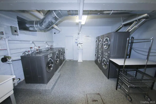 a utility room with cabinets