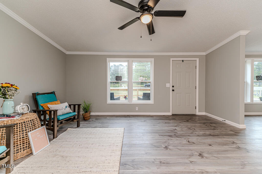 2245 Docs Road Lillington, NC 27546 - Photo 12 of 54 a living room with furniture and a window
