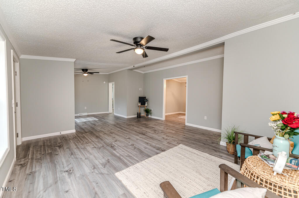 2245 Docs Road Lillington, NC 27546 - Photo 14 of 54 a view of a livingroom with furniture and wooden floor