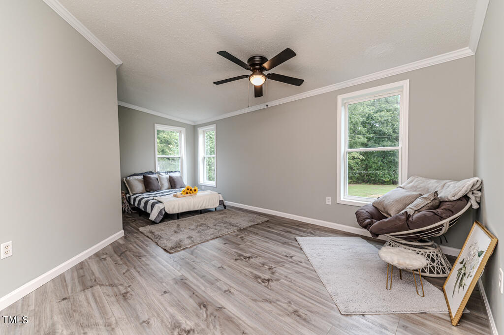 2245 Docs Road Lillington, NC 27546 - Photo 31 of 54 a living room with furniture and a window
