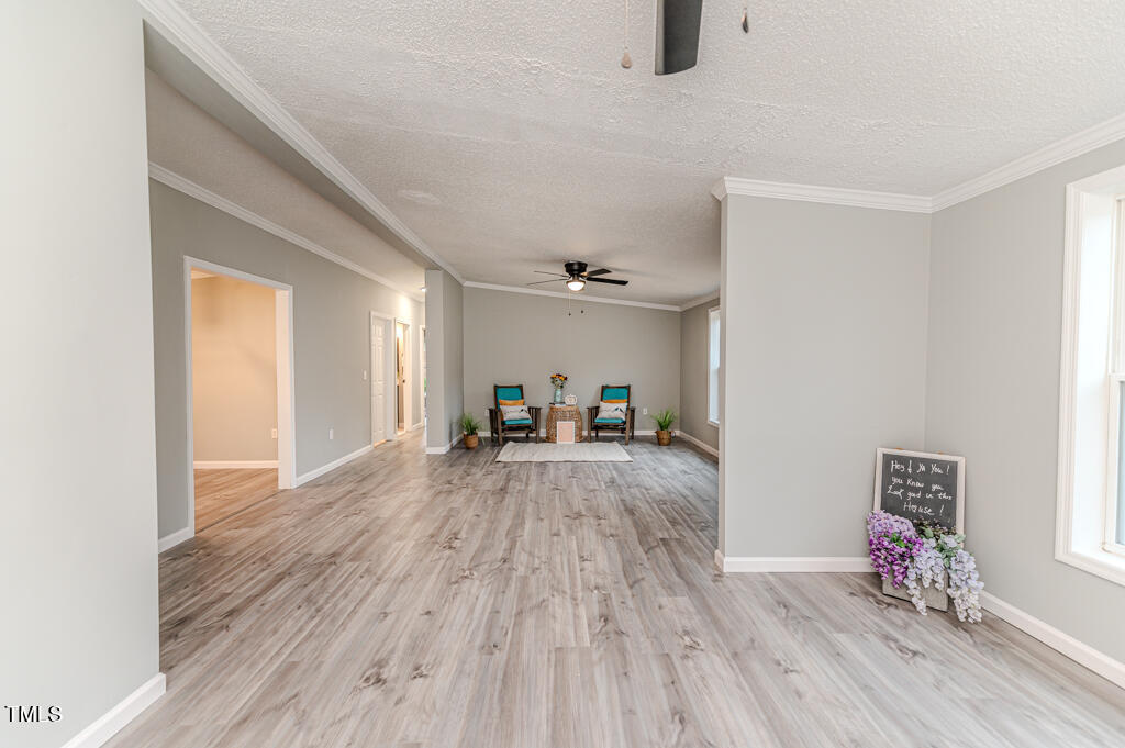 2245 Docs Road Lillington, NC 27546 - Photo 33 of 54 a view of a livingroom with wooden floor