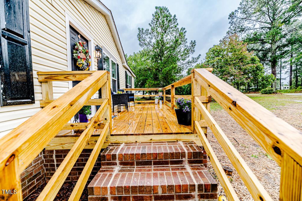 2245 Docs Road Lillington, NC 27546 - Photo 4 of 54 a view of a building with a outdoor space