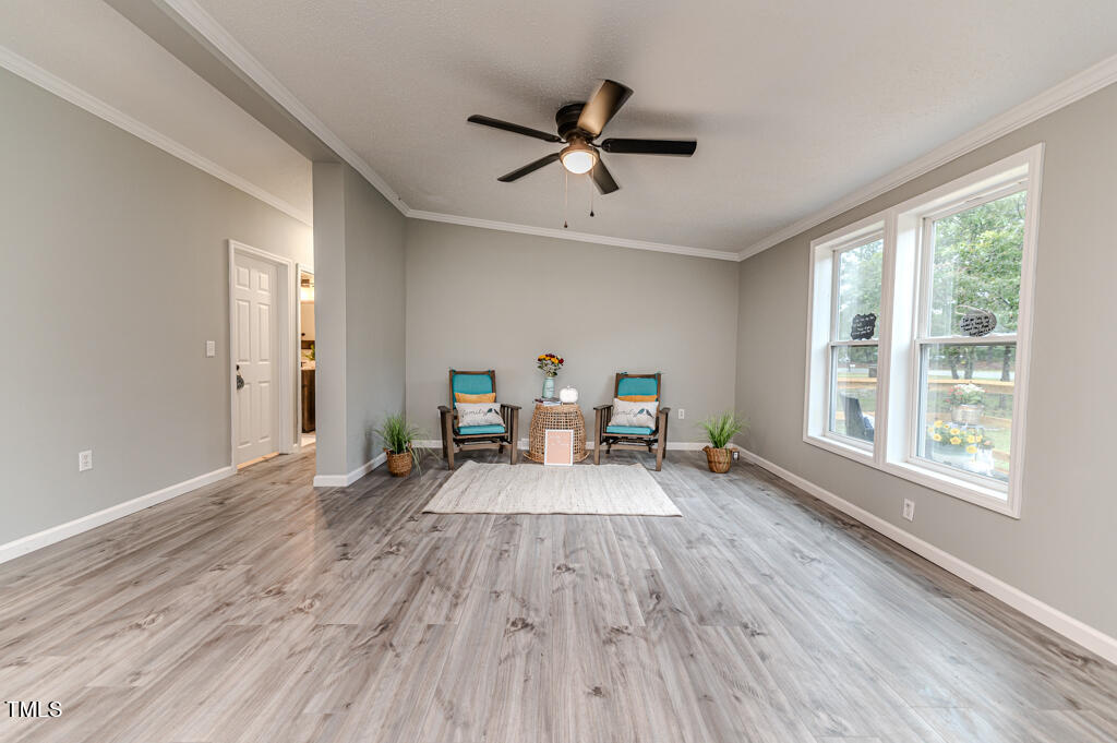 2245 Docs Road Lillington, NC 27546 - Photo 10 of 54 a living room with furniture and a wooden floor